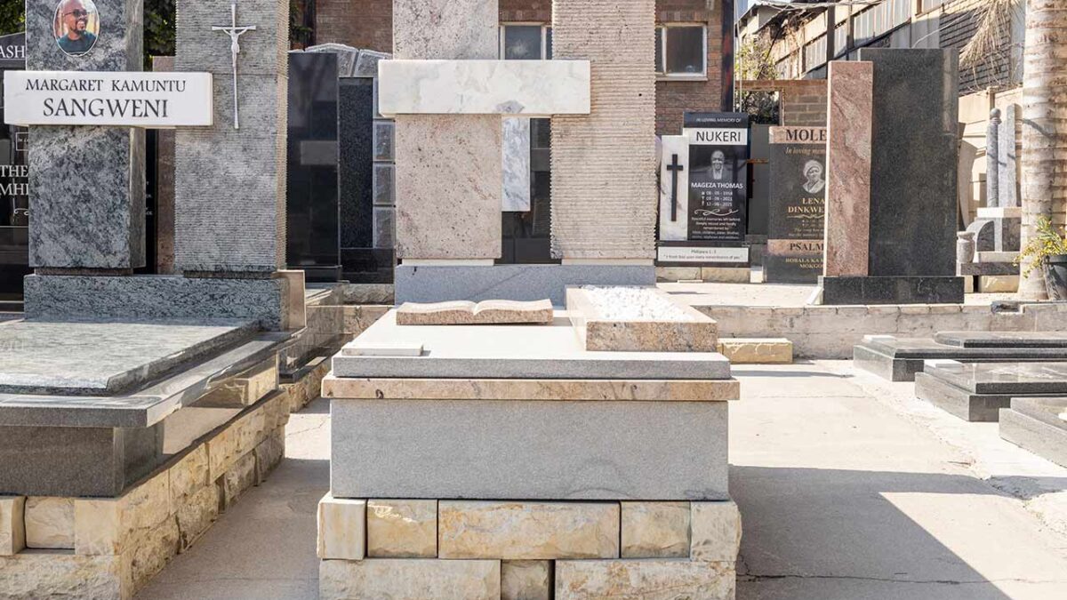 Granite tombstone artisan polishing a headstone at Tombstone Factory South Africa